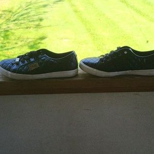 Lightly used Guess quilted black leather sneakers size 9